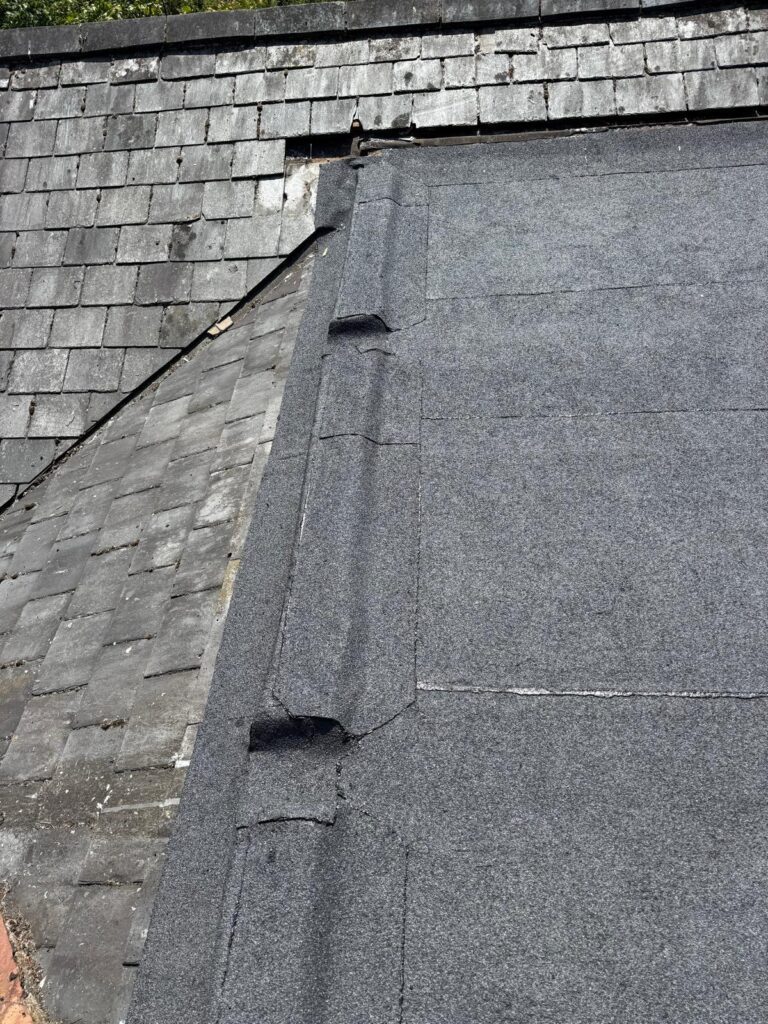 Flat Roofing 3 Flat roof installation adjoining a tiled pitched roof, showcasing seamless integration by checka roof ltd in kent, essex, or london.